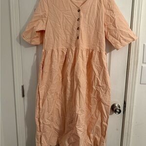 Elegant Peach Midi Dress with Button Detail